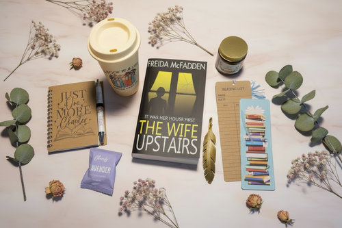 Book lover gift set flat lay with blush pink marble background